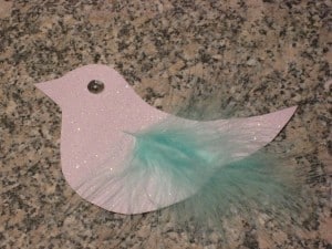 glue on a sequin eye and feather wings