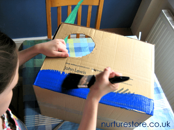 Boat made with a cardboard box  Cardboard boat, Kids role play, Cardboard  box boats