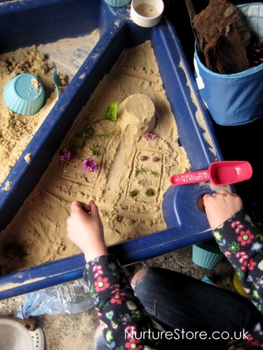 small world play sand pit