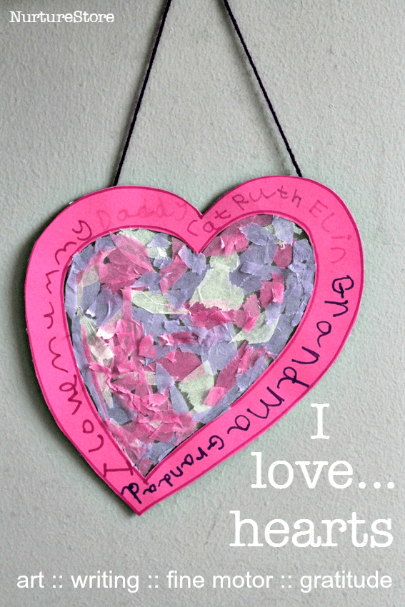 Gorgeous easy Valentine craft for kids - contact paper hearts with a focus on fine motor skills and gratitude
