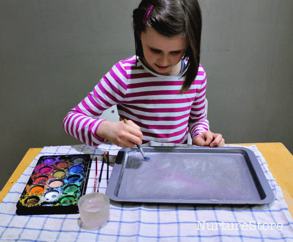 kids art project painting on ice