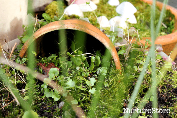 flower pot houses in a fairy garden