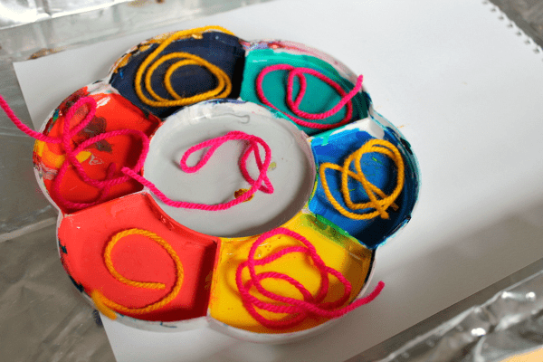 process art painting with yarn