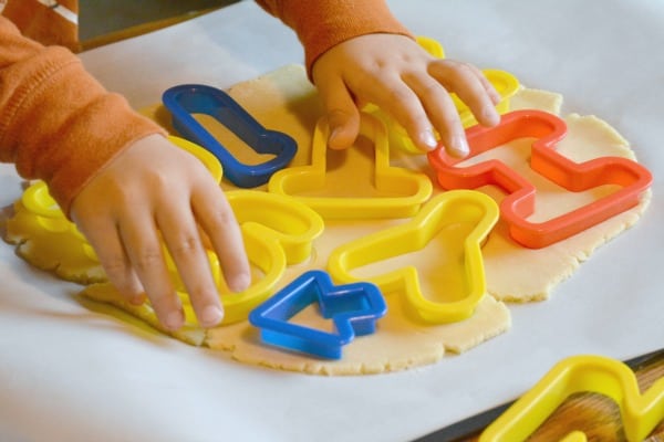 pressing letters into alphabet cookie recipe