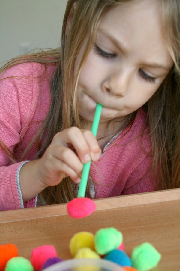 pool game craft with pompoms and straw