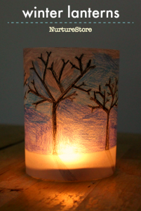 Winter paper lantern craft project using cool colors and winter skyline ...