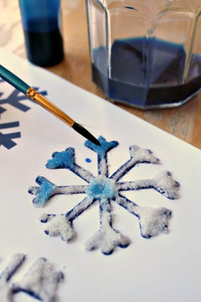 Salt glue and watercolor painting to make snowflake art