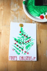 Leaf print Christmas tree craft for forest school - NurtureStore