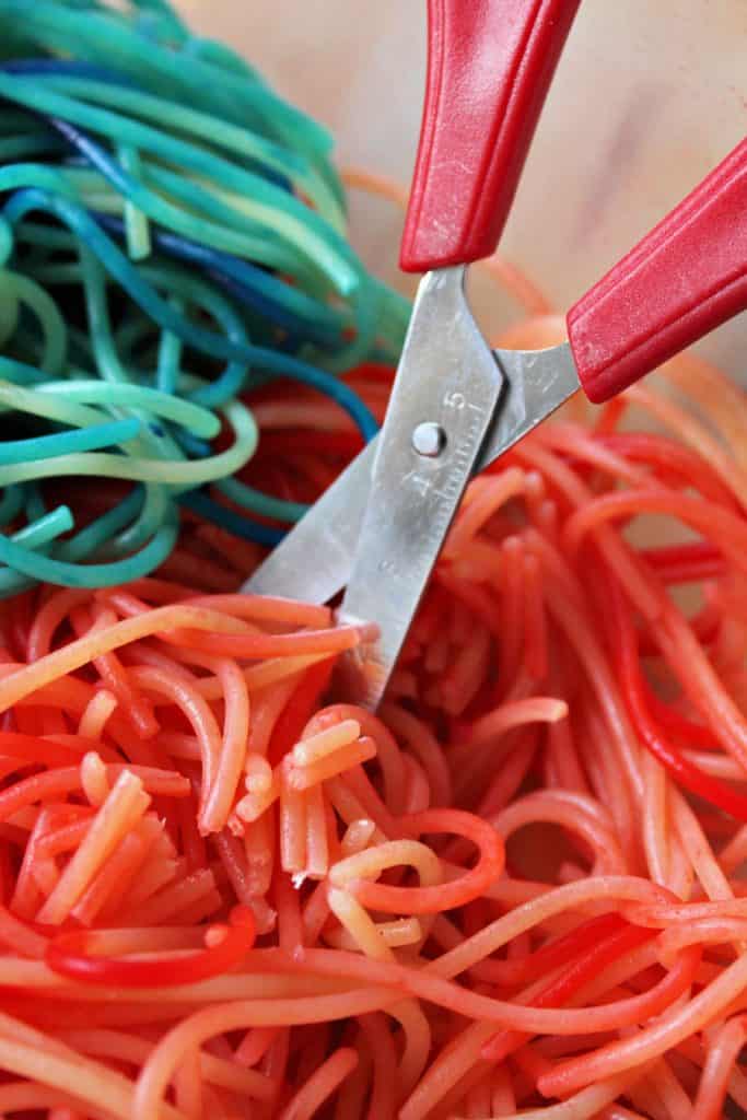 Spaghetti Cutting Bin - Scissor Skills Activity - Busy Toddler